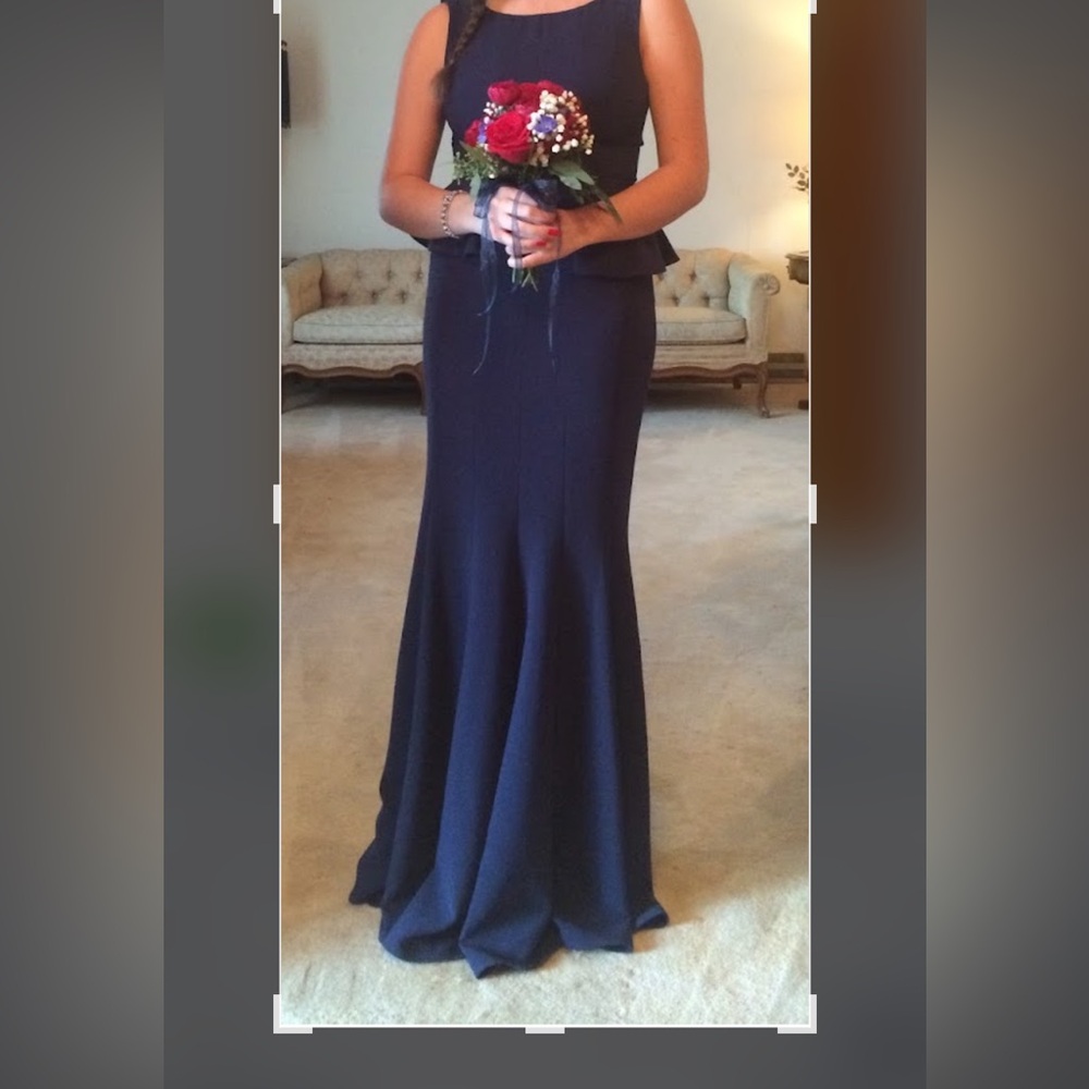 Size 6 Navy Gown sleeveless w peplem at waist! paid $250. Asking 30.